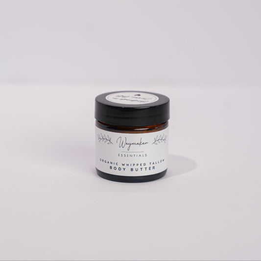 Small jar with a black lid on a white background - Organic tallow body butter