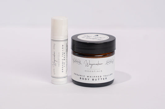 Two skincare products, a bottle and a jar, on a white background - organic tallow