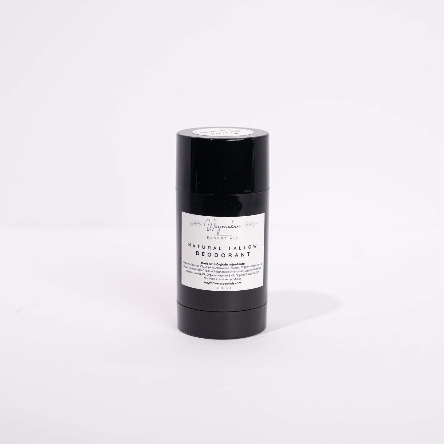 Black deodorant stick with a label on a white background - Organic deodorant